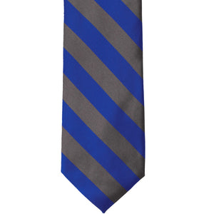 The front of a royal blue and gray striped tie, laid out flat