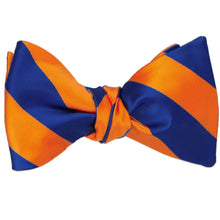 Load image into Gallery viewer, Royal blue and orange striped self-tie bow tie, tied