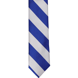 The front of a royal blue and silver striped skinny tie