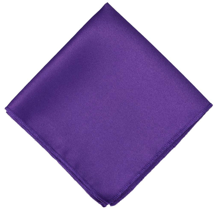Solid royal purple pocket square folded into a diamond