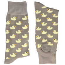 Load image into Gallery viewer, A folded pair of gray socks with light yellow rubber duckies