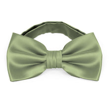 Load image into Gallery viewer, A sage bow tie, pre-tied and shown with its band collar bow tie