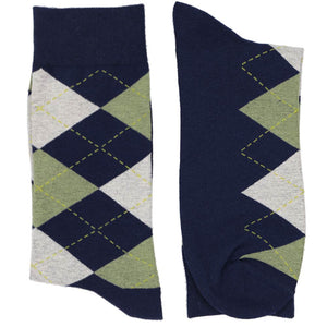 A pair of folded sage green argyle socks