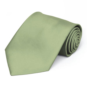 A sage solid color tie, rolled to show off the front of tie