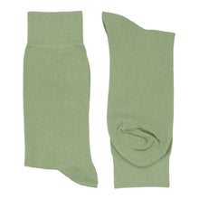 Load image into Gallery viewer, A folded pair of sage solid dress socks