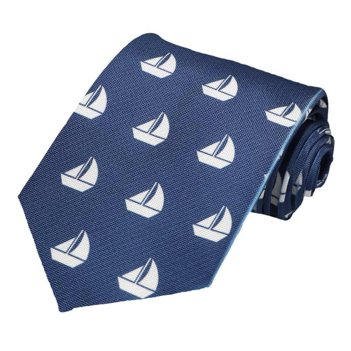 White sailboats on a navy tie.