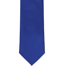 Load image into Gallery viewer, The front bottom view of a solid herringbone necktie in sapphire blue