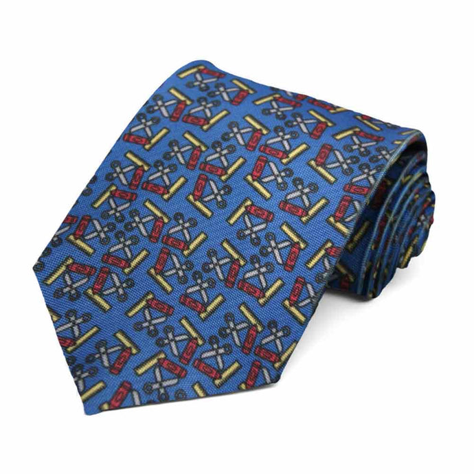 School supplies on a blue tie.