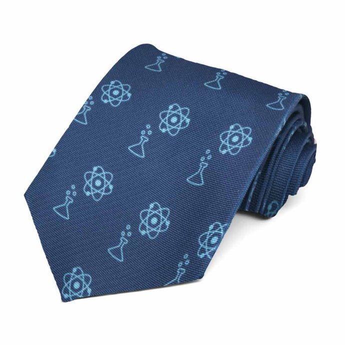 A light blue beaker and atom design on a dark blue tie