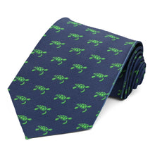 Load image into Gallery viewer, A navy necktie with green sea turtles swimming across the design, rolled to show off the theme
