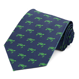 A navy necktie with green sea turtles swimming across the design, rolled to show off the theme
