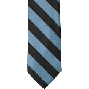 The front of a serene and black striped tie
