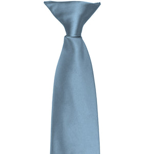 The pre-tied knot on a serene blue clip-on tie