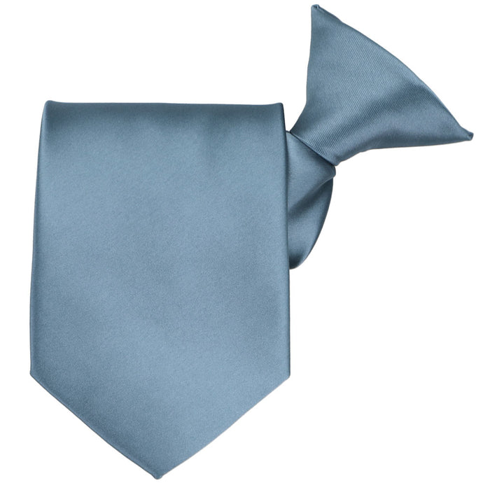 A serene blue clip-on tie, folded to display the pre-tied knot and tip of the tie