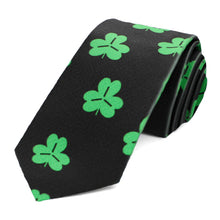 Load image into Gallery viewer, A green shamrock slim tie on a black background