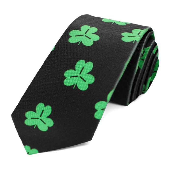 A green shamrock slim tie on a black background