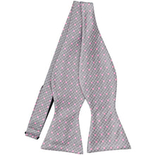 Load image into Gallery viewer, An untied silver bow tie with pink polka dots