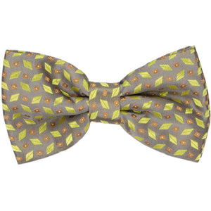 Silver bow tie with small yellow and orange geometric shapes