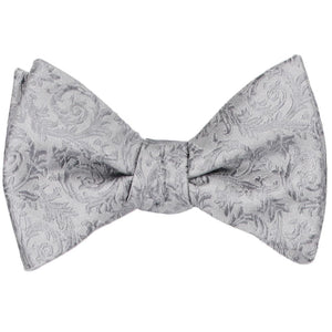 A tied silver tone-on-tone floral self-tie bow tie