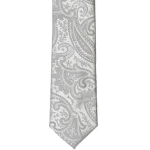 Load image into Gallery viewer, The front bottom of a silver paisley tie