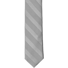 Load image into Gallery viewer, The front of a silver skinny striped tie, laid out flat