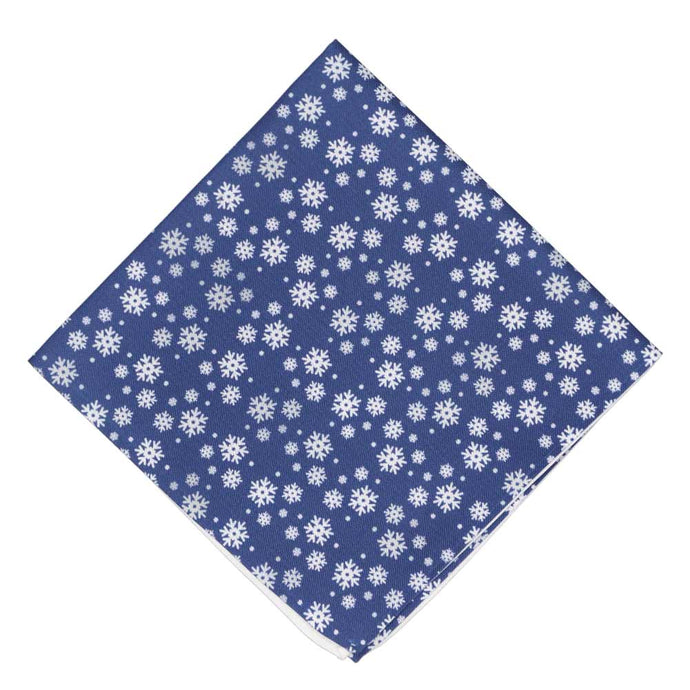 A dark blue novelty pocket square with an all over white snowflake pattern