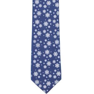 The front of a dark blue tie with scattered snow flakes