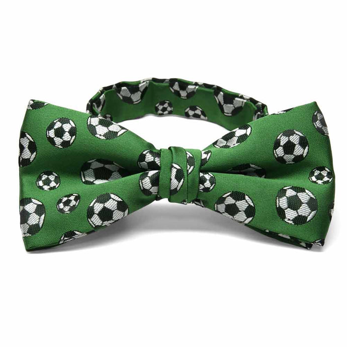 Soccer theme bow tie on a green background.