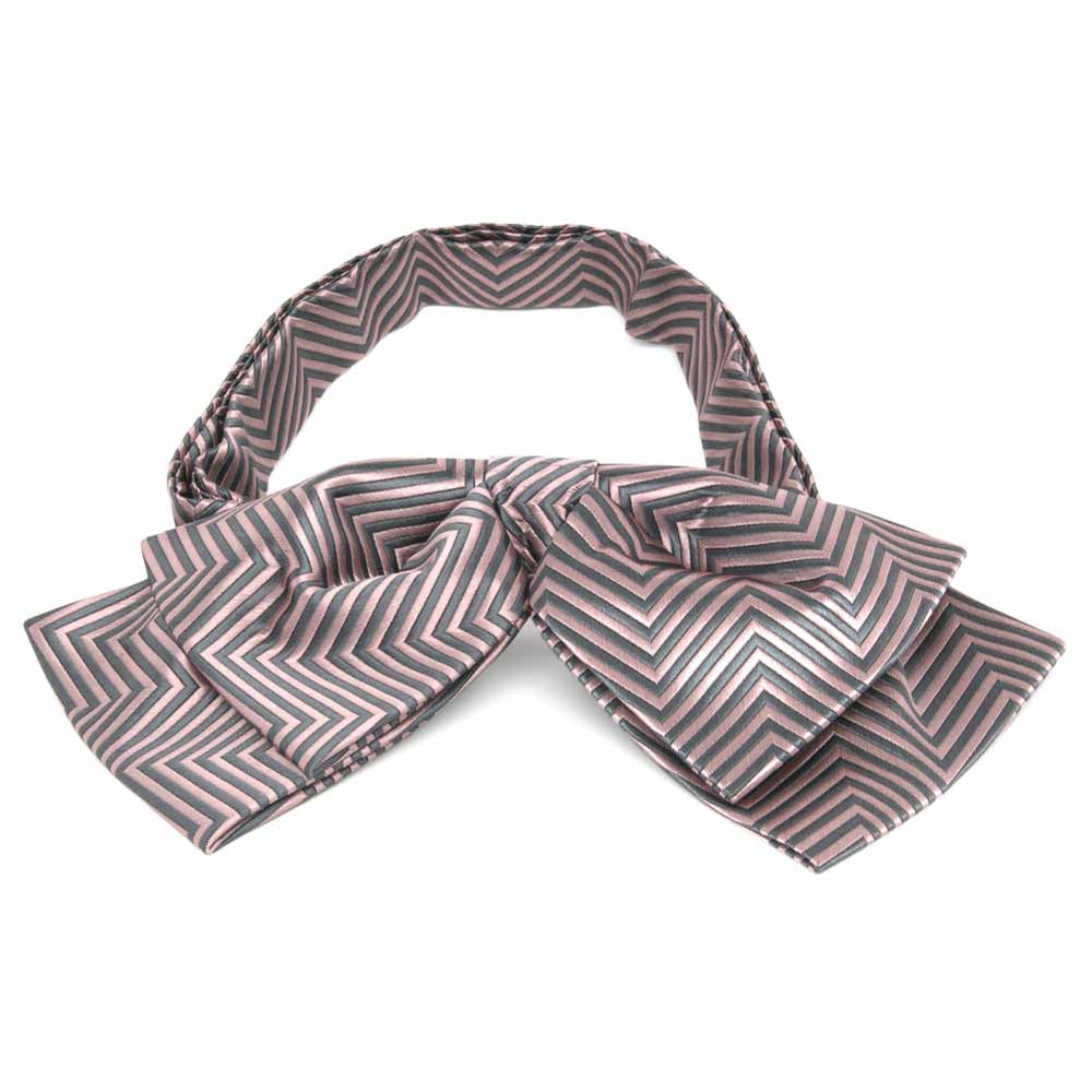 Front view of a pink and gray chevron pattern floppy bow tie