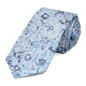 Steel blue floral tie, rolled to show texture and pattern