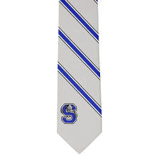 Load image into Gallery viewer, Gray, blue and white striped tie with a Sterling Middle School logo on the bottom left tip