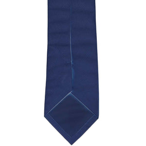 Back of a dark blue necktie