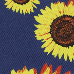 Closeup of a sunflower pattern on a dark blue background