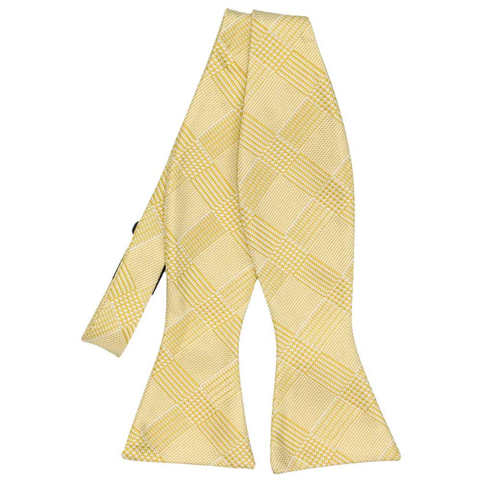 Light yellow plaid self-tie bow tie, untied flat front view