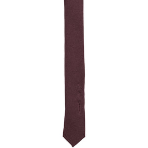 Tie tail with button tabs on a maroon uniform tie