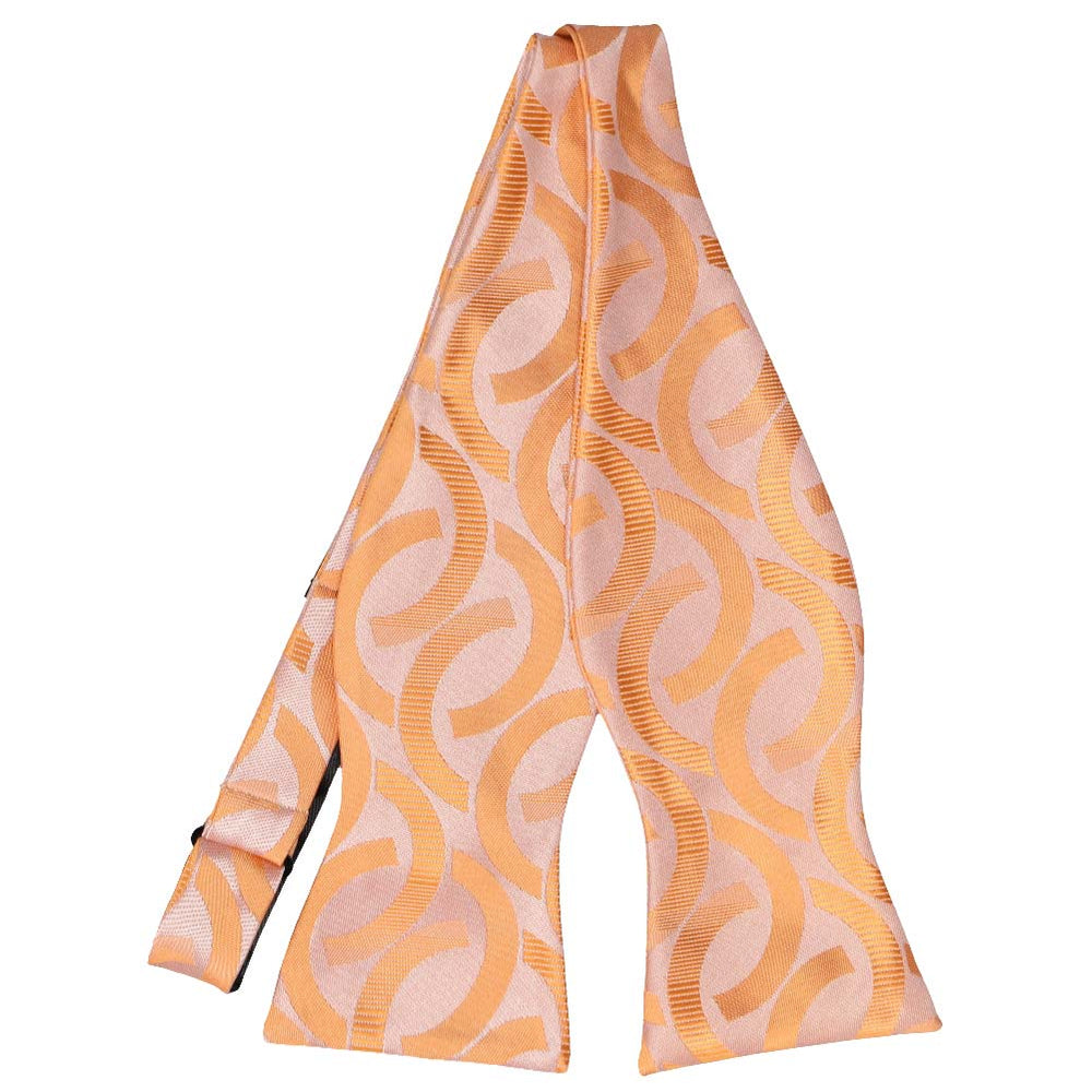 Orange link pattern self-tie bow tie, untied front view