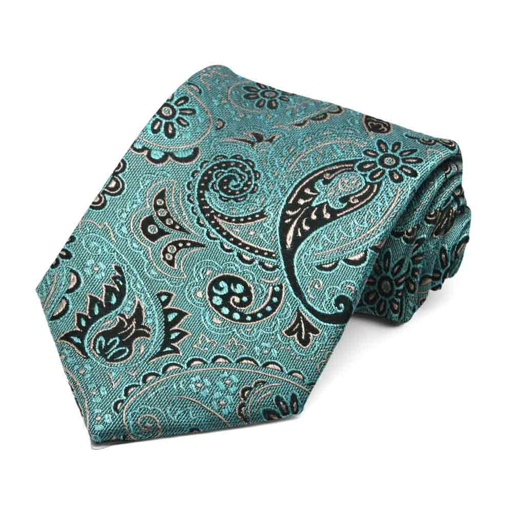Teal and tan paisley necktie, rolled to show woven texture