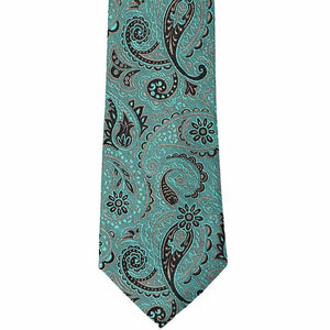 The front of a textured teal paisley tie with tan accents