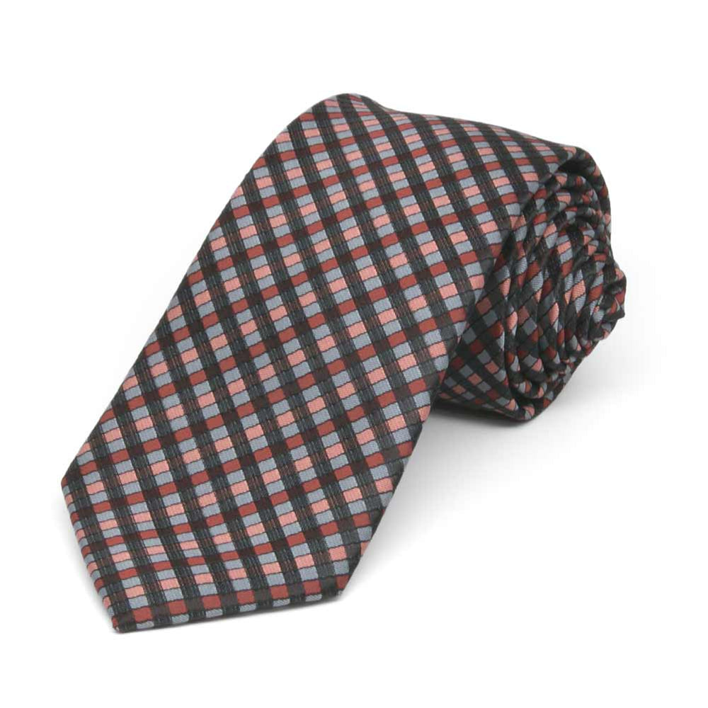Slim terracotta, black and mauve plaid necktie, rolled view
