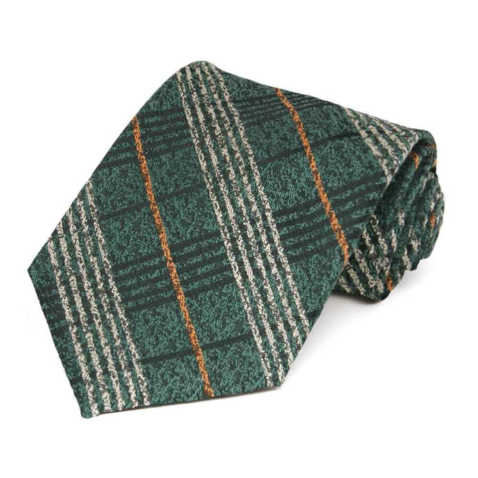 Dark green plaid necktie with thin orange and tan stripes rolled to show splotchy texture