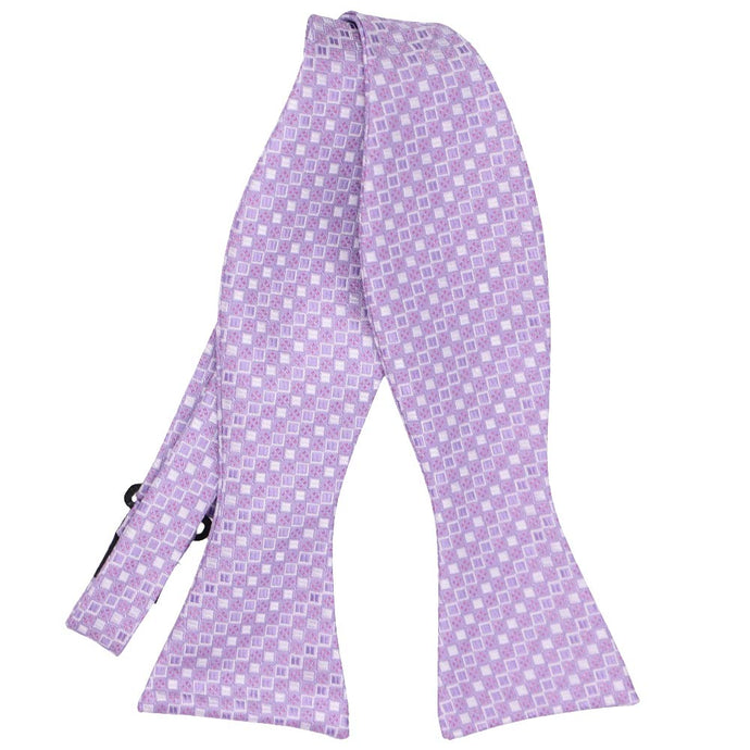 Light purple small square pattern self-tie bow tie, flat front untied view