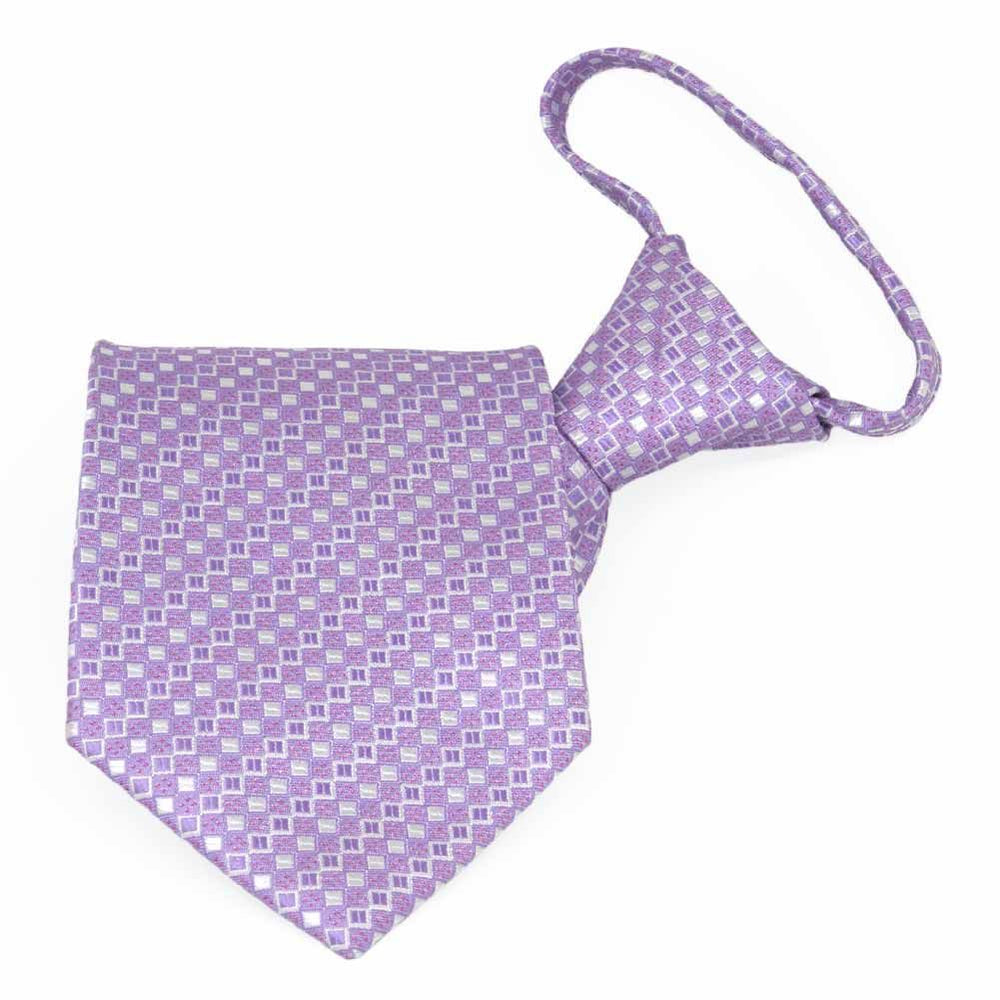 Folded front view of a light purple small square pattern zipper tie