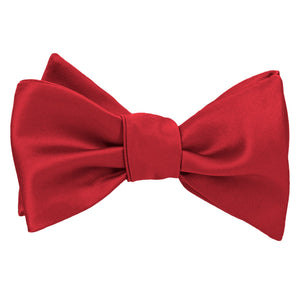Tied red self-tie bow tie