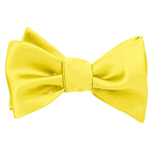 Tied yellow self-tie bow tie