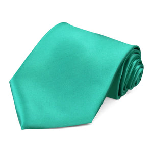 Blue and greenish tropical color teal necktie.