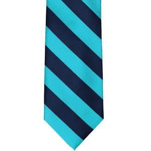 The front of a turquoise and navy blue striped tie, laid out flat