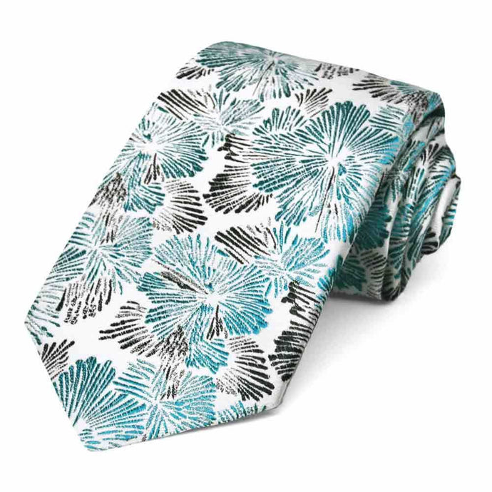 Turquoise, black and white bursting floral pattern tie, rolled to show pattern close up