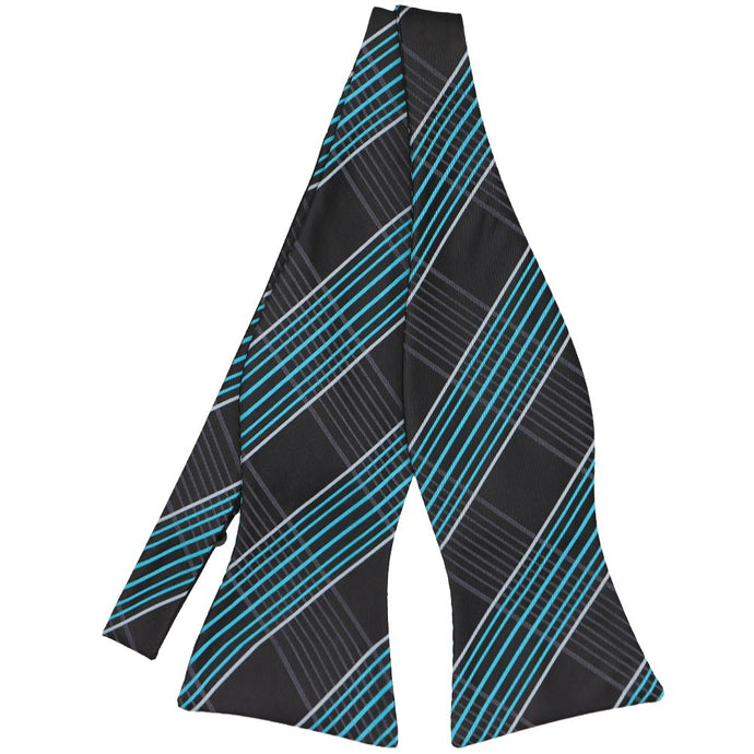 Turquoise and black plaid self-tie bow tie, untied flat front view