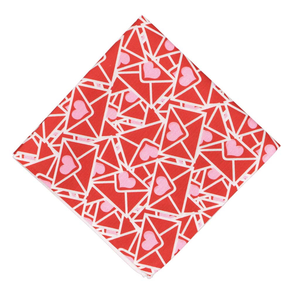 Valentine envelopes scattered across a pocket square, folded into a diamond shape