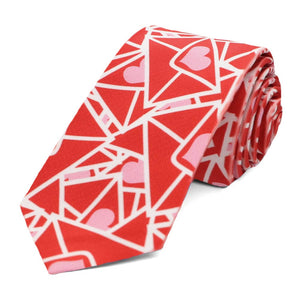 A slim tie, rolled to show off the red and pink envelope design